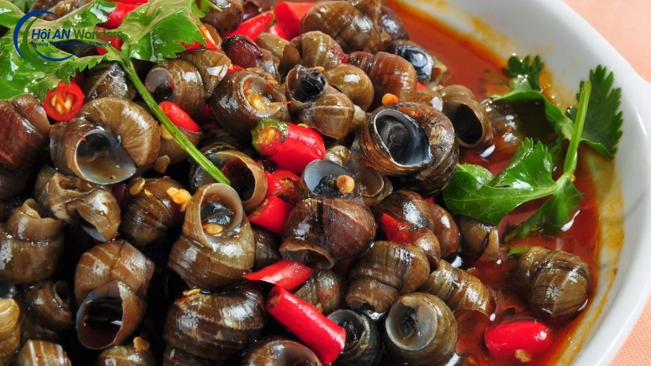 Hoi An Basket Boat 36 Stir-fried snails with lemongrass and chili